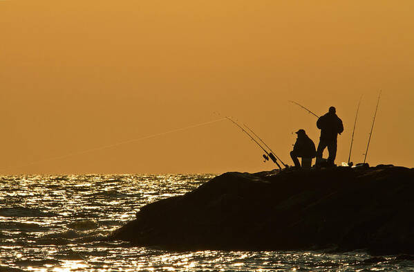 Sunset Poster featuring the photograph Sunset Fishermen by David Freuthal