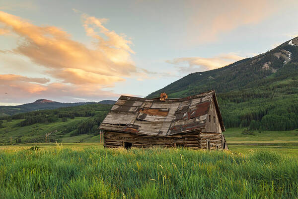 Crested Butte Poster featuring the photograph Sunset Over An Abandoned Cabin by Lorraine Baum
