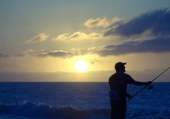 Surfcasting Poster featuring the photograph Surfcasting by Newwwman