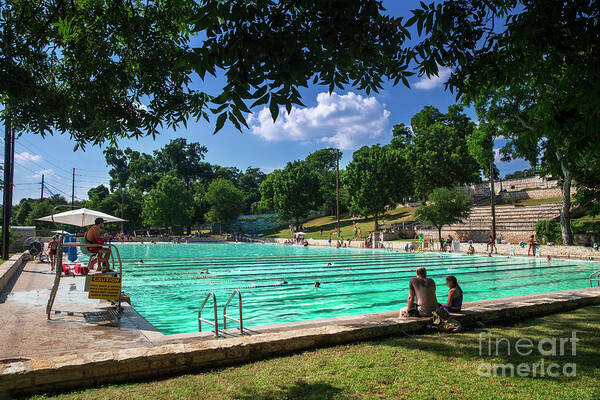 Deep Eddy Pool Poster featuring the photograph Swimmers swim laps while others relax at Deep Eddy Pool, the perfect prescription to beat Texas brutal summer 100 degree heat wave by Dan Herron