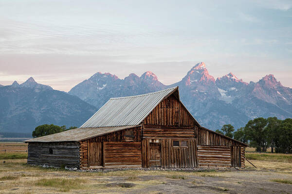 Mormon Row Poster featuring the photograph T.A. Moulton Barn Grand Tetons Sunrise by John McGraw