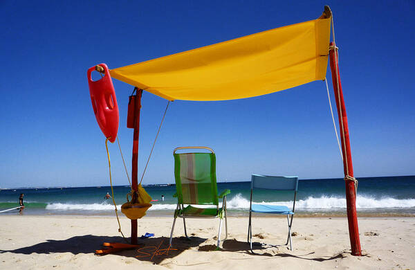 Life Guard Poster featuring the photograph The Lonely Sea And the Sky by Charles Stuart