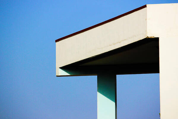 Clear Blue Sky Poster featuring the photograph The Slight Tilt by Prakash Ghai