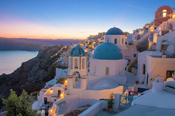 Sunset Poster featuring the photograph The three blue domes of Oia by Matt McDonald