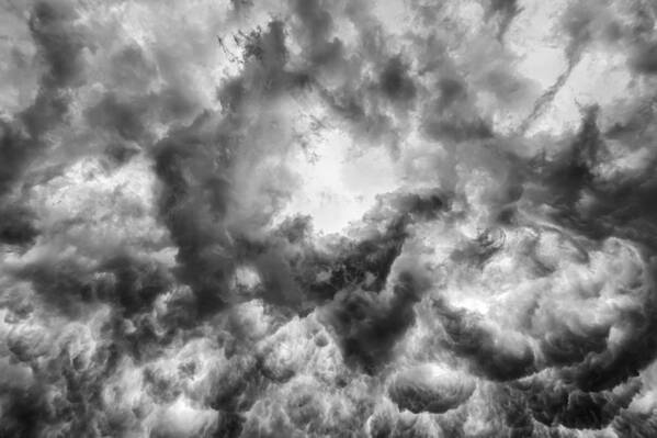 Storm Clouds Poster featuring the photograph The Eye by Charles McCleanon