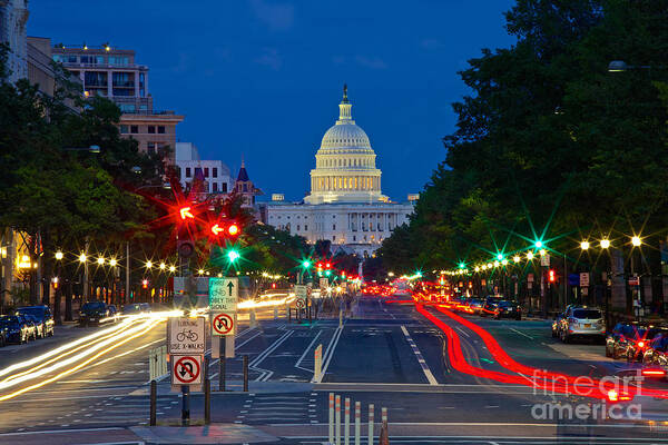 Light Streaks Poster featuring the photograph United States Capitol along Pennsylvania Avenue in Washington, D.C.  by Sam Antonio