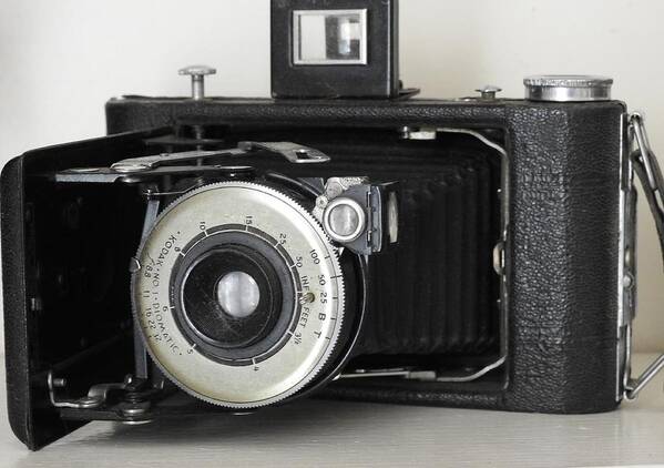 Vintage Poster featuring the photograph Vintage Camera by Jan Gelders