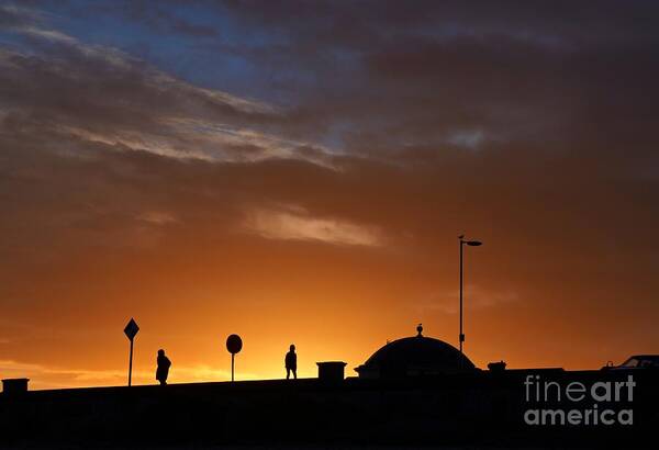 Sunsets Poster featuring the photograph Walking at Sunset by Les Bell