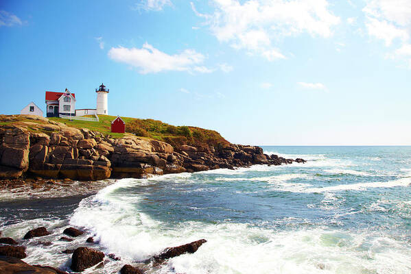 Scenics Poster featuring the photograph Cape Neddick Nubble Lighthouse #1 by Thomas Northcut