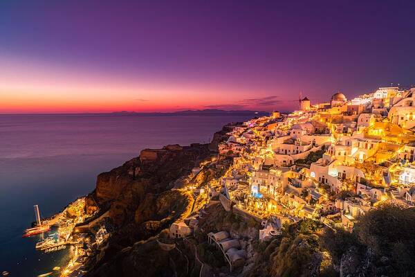 Landscape Poster featuring the photograph Oia Town Cityscape At Santorini Island #1 by Levente Bodo