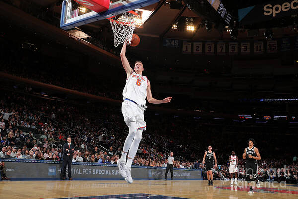 Kristaps Porzingis Poster featuring the photograph Brooklyn Nets V New York Knicks #2 by Nathaniel S. Butler
