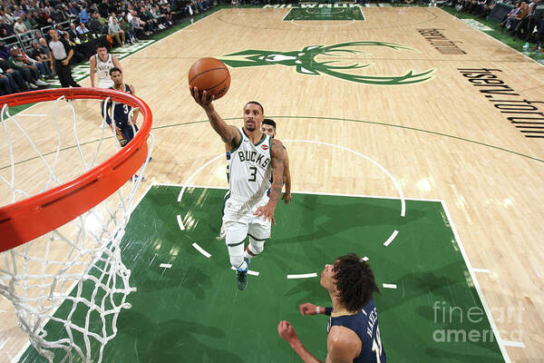 George Hill Poster featuring the photograph New Orleans Pelicans V Milwaukee Bucks #3 by Gary Dineen