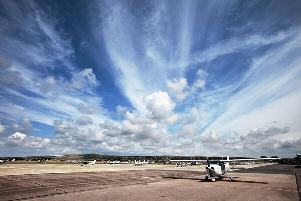 Shoreham-by-sea Poster featuring the photograph Airport Cloudscape And Light Planes by Stevegeer