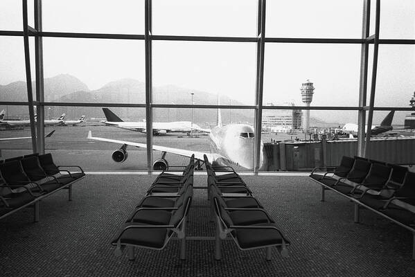 Airport Departure Area Poster featuring the photograph Airport Waiting Area B&w by Walter Bibikow