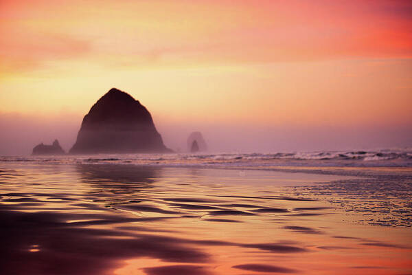 Dawn Poster featuring the photograph Cannon Beach Haystack Rock by Ryanjlane