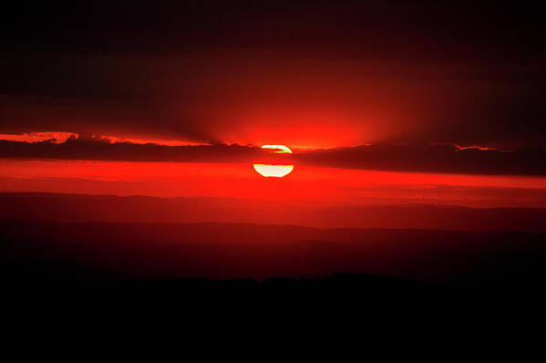 Sunset Poster featuring the photograph Dark red sun in Vogelsberg by Sun Travels