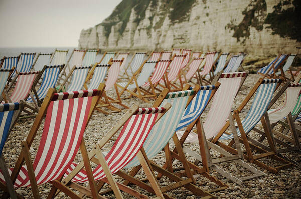 Empty Poster featuring the photograph Deck Chairs On Empty Beach by Alison Wooder