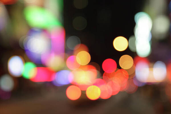 Funky Poster featuring the photograph Defocused Light Dots At Times Square In by Sebastian-julian