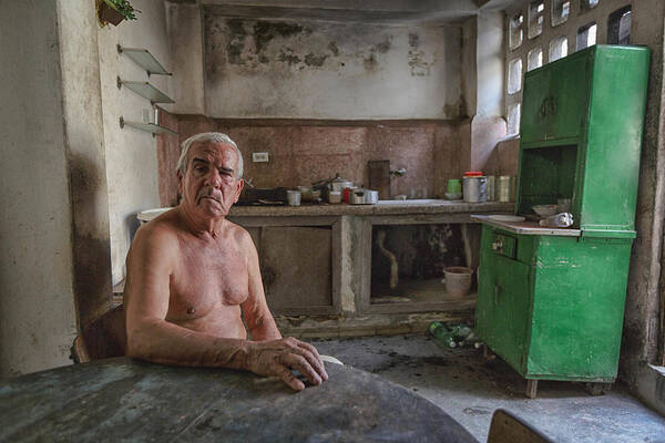 #despair #lone #loneliness #elderly #old #people #havana #cuba #poor #empty #emptyness #man #poverty #people Poster featuring the photograph Despair by Tali Stein