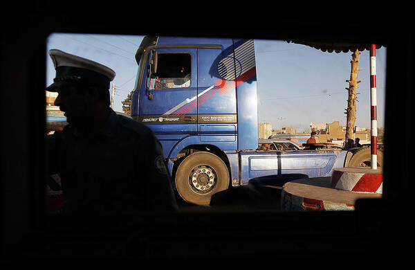 War Poster featuring the photograph Herat Through A Humvee Window by Chris Hondros