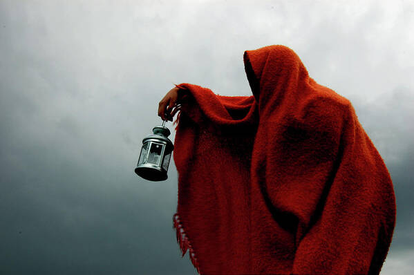 People Poster featuring the photograph Hooded Crone Holds Lantern In Storm by Kewaters