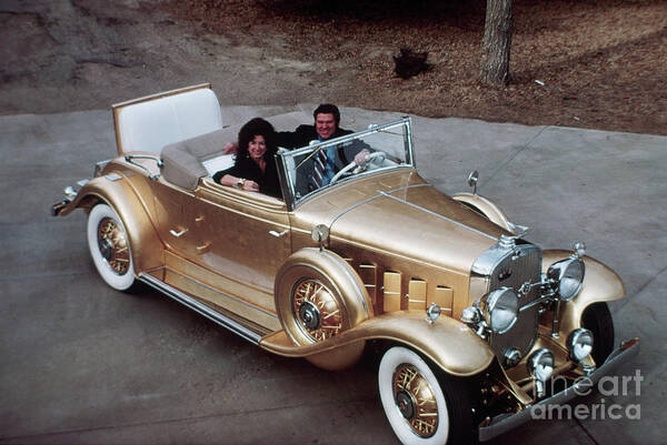Mid Adult Women Poster featuring the photograph Jack Smith In Gold Plated 1931 Cadillac by Bettmann