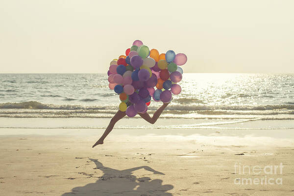 Child Poster featuring the photograph Jumping Girl With Balloons by Vizerskaya