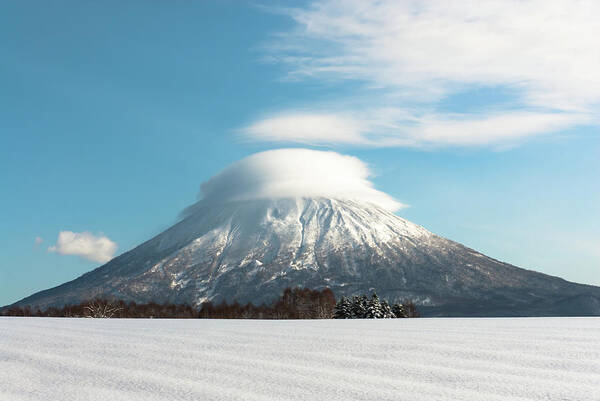 Tranquility Poster featuring the photograph Lenticular Cloud Over Mt Yotei by Kris Gaethofs