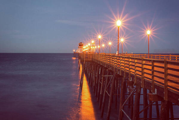 Oceanside Pier Dawn Lights Poster featuring the photograph Oceanside Pier Dawn Lights by Joseph S Giacalone