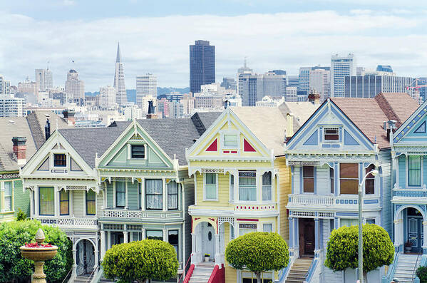 In A Row Poster featuring the photograph Painted Ladies Houses Next To Alamo by Gregobagel