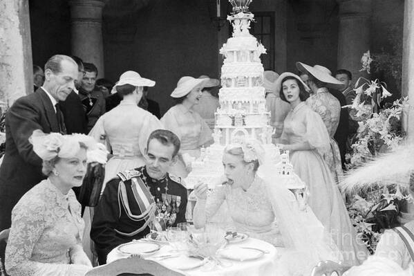 Following Poster featuring the photograph Prince Rainier And Grace Kelly Eating by Bettmann