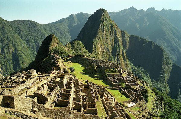 Machu Picchu Poster featuring the photograph The Ruins Of Machu Picchu, Peru, Latin by Brian Caissie