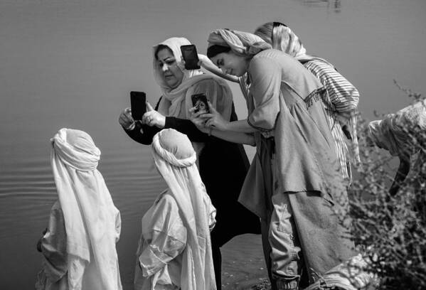 #iran #ahvaz #karunriver #baptism #tradition Poster featuring the photograph Tradition And Modernity by Sima Fazel