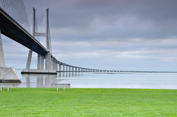 Long Poster featuring the photograph Vasco Da Gama Bridge In Lisbon by Nickilford