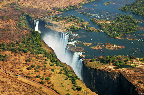 Scenics Poster featuring the photograph Victoria Falls, Zambia by © Pascal Boegli