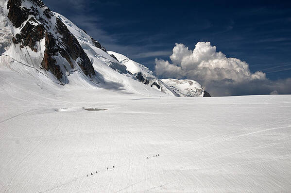 Mountain Poster featuring the photograph Walking On The Glacier by Marco Tomassini