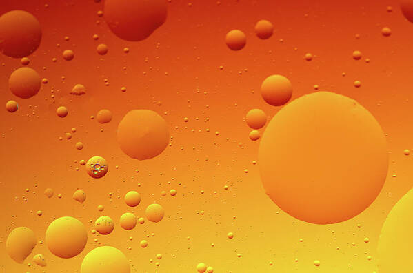 Connection Poster featuring the photograph Bright abstract, yellow background with flying bubbles #1 by Michalakis Ppalis
