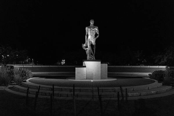 Spartan Staue Night Poster featuring the photograph Spartan statue at night on the campus of Michigan State University in East Lansing Michigan #1 by Eldon McGraw