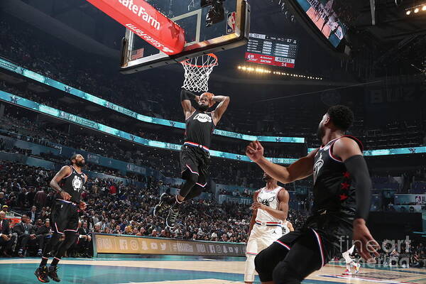 Dwyane Wade Poster featuring the photograph Dwyane Wade and Lebron James by Nathaniel S. Butler