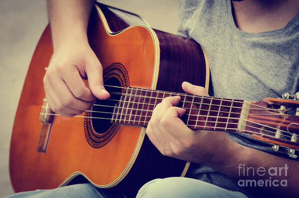 Guitar Poster featuring the photograph Man plays the guitar #2 by Jelena Jovanovic