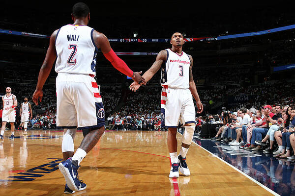 Bradley Beal Poster featuring the photograph John Wall and Bradley Beal #6 by Ned Dishman