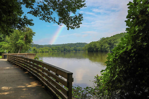 Water Poster featuring the photograph A Rainbow Over the Roswell Riverwalk Boardwalk by Marcus Jones
