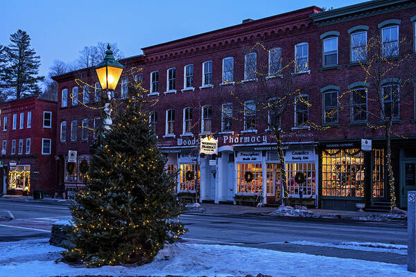 Woodstock Poster featuring the photograph Downtown Woodstock VT Christmas Tree at Dusk Woodstock Pharmacy by Toby McGuire