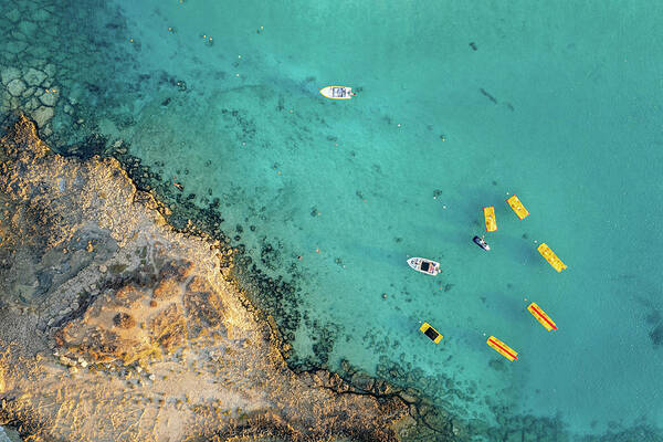Seascape Poster featuring the photograph Drone aerial of seascape with idyllic blue calm blue water. Fig tree bay beach Protaras Cyprus by Michalakis Ppalis
