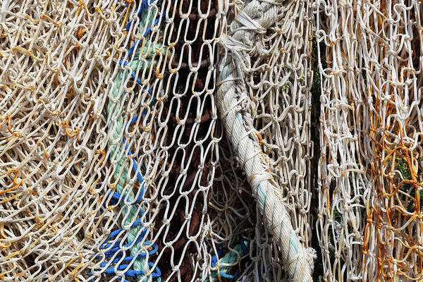 Fishing Net Poster featuring the photograph Fishing nets and ropes by Fabiano Di Paolo