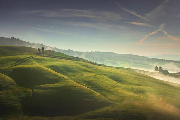 Tuscany Poster featuring the photograph Foggy morning in Tuscany, rolling hills and trees. by Stefano Orazzini