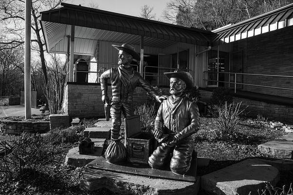 Frank James Poster featuring the photograph Frank and Jesse James statues at Meramec Caverns on Historic Route 66 in black and white by Eldon McGraw