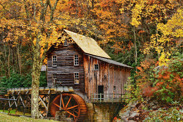 Babcock State Park Poster featuring the photograph Grist Mill in Autumn Hues by Ola Allen