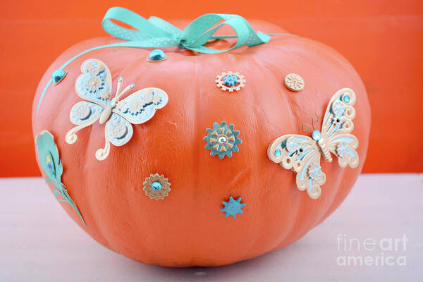 Thanksgiving Poster featuring the photograph Hand painted and decorated orange pumpkin. by Milleflore Images