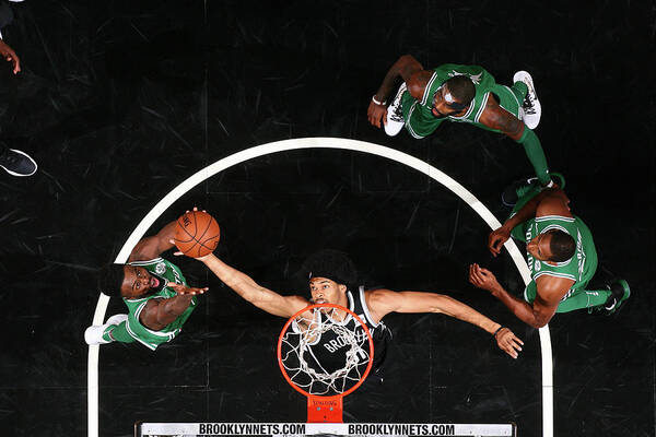 Jarrett Allen Poster featuring the photograph Jaylen Brown and Jarrett Allen by Nathaniel S. Butler